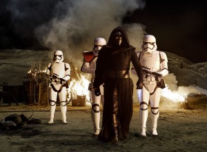 Kylo Ren (Adam Driver) with Stormtroopers in STAR WARS: THE FORCE AWAKENS. ©Lucasfilms. CR: David James.